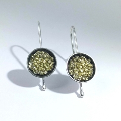 Pendientes geoda, realizados en plata con patina de oxidacion y pirita