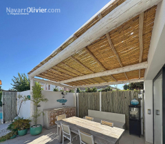 Comedor mediterraneo con pergola natural en marbella