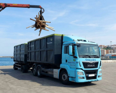 Camion en carga de residuos