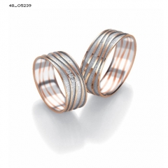 Pareja alianzas de boda en oro rosa y balnco con diamantes serie limitada
