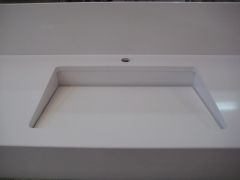 Lavabo de diseno en silestone con desague oculto