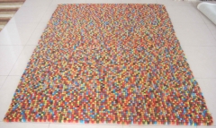 Alfombra de bolas de fieltro, fabricacion manual