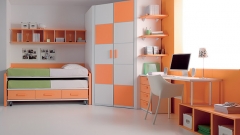 Dormitorio juvenil con compacto y armario rincon en colores naranja