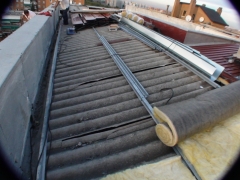 Impermeabilizacion de tejados. mediante istalacion de cubierta de chapa con aislante