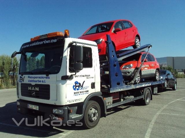 Transporte en gra portacoches de vehculos nuevos