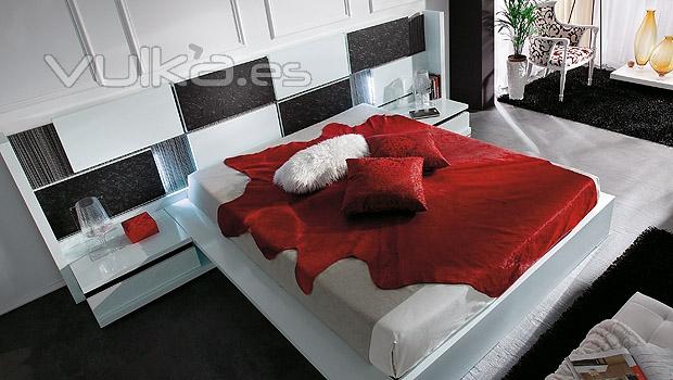 Dormitorio moderno con cabezal panelado lacado blanco y negro