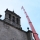 Autogrúa con plumín realizando trabajos en la iglesia de San Francisco en Trujillo (Cáceres)