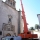 Autogra con plumn realizando trabajos en la iglesia de San Francisco en Trujillo (Cceres)