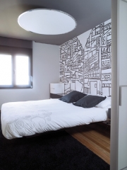 Dormitorio con mural de diseo propio