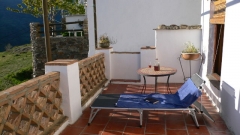 Terraza con tumbona casa de la luz