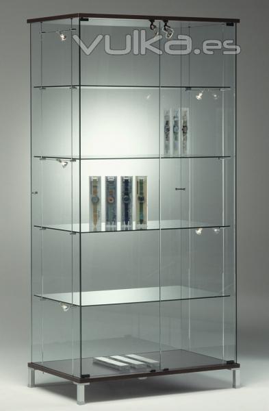 Vitrinas de vidrio, acabado wengu, patas regulables, puertas batientes, con iluminacin.