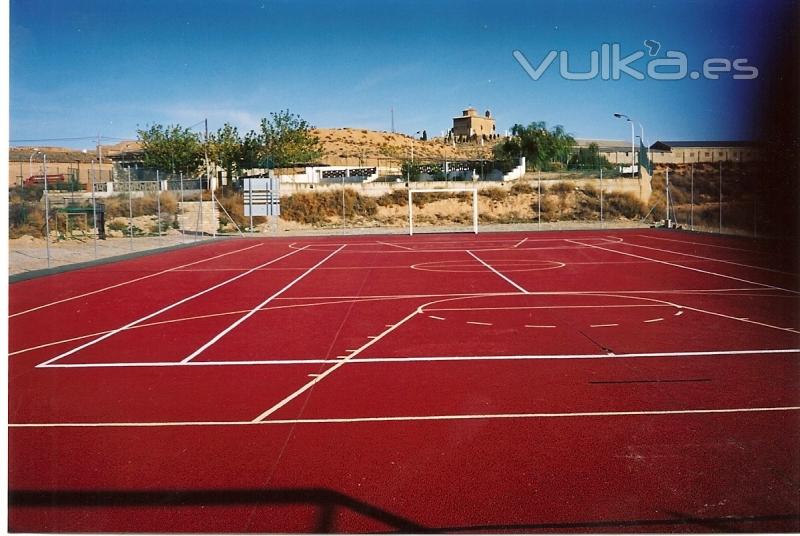 Construccin de pista polideportiva de hormign poroso